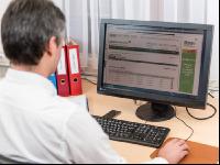 Im Büro 55