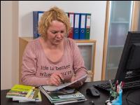Im Büro 129